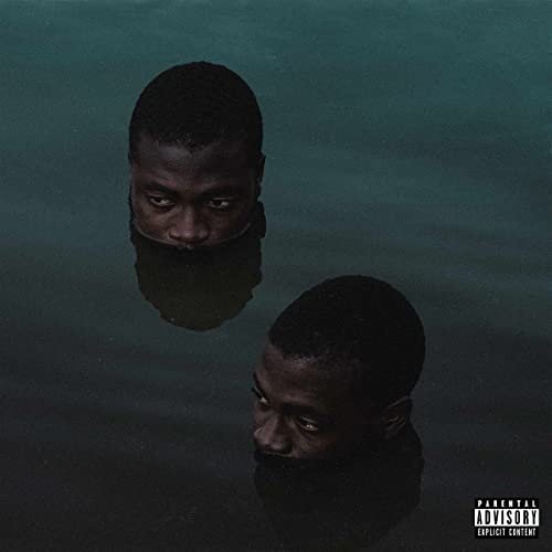Album cover: a man’s face reflected in dark water, looking upwards.