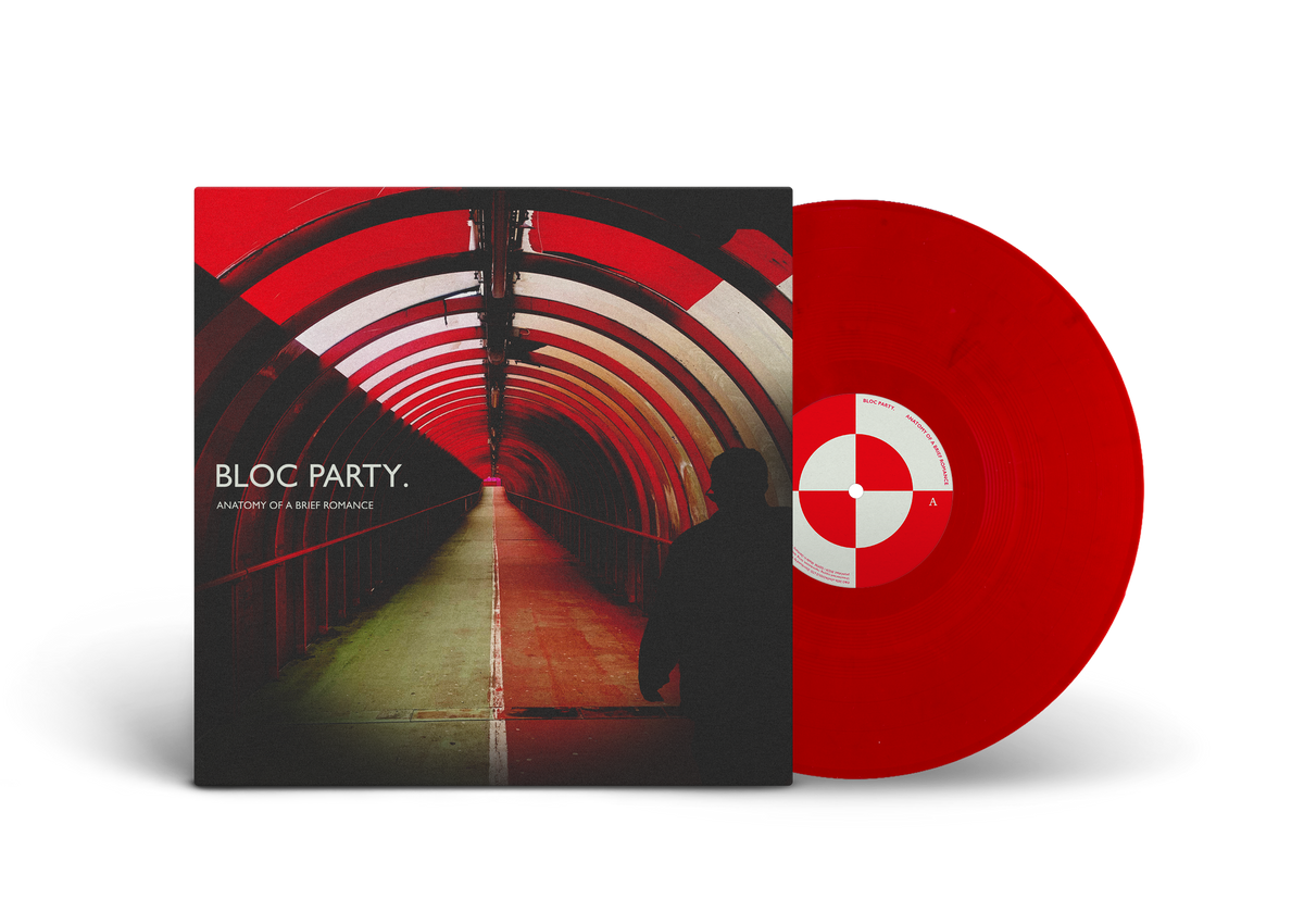 Bloc Party album cover and red vinyl record, side view.