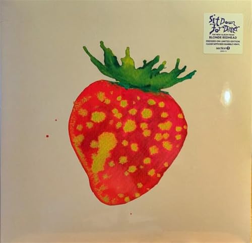Vinyl record cover with a painted strawberry and album title text.