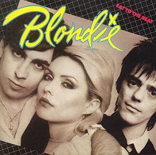 Album cover featuring Blondie band members with yellow text against a black grid background.
