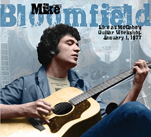 Mike Bloomfield playing acoustic guitar, album cover for “Live At McCabe’s”.