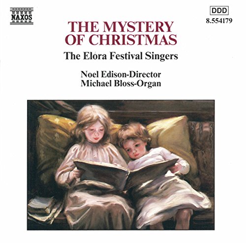 CD cover: two children reading a book on a plush couch.