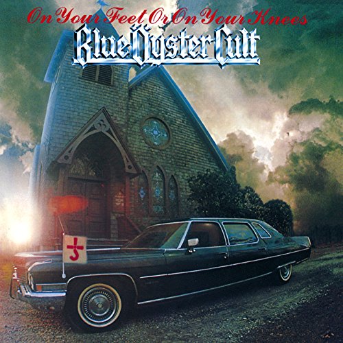 Blue Oyster Cult album cover: church, classic car, and foggy landscape.