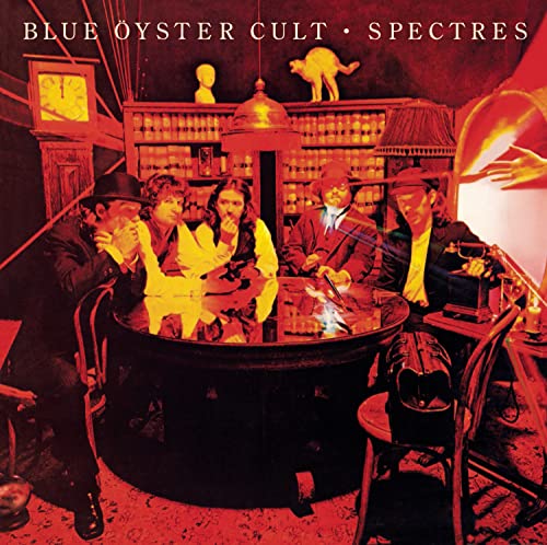 Blue Oyster Cult album cover, five people in a vintage, dimly lit room.