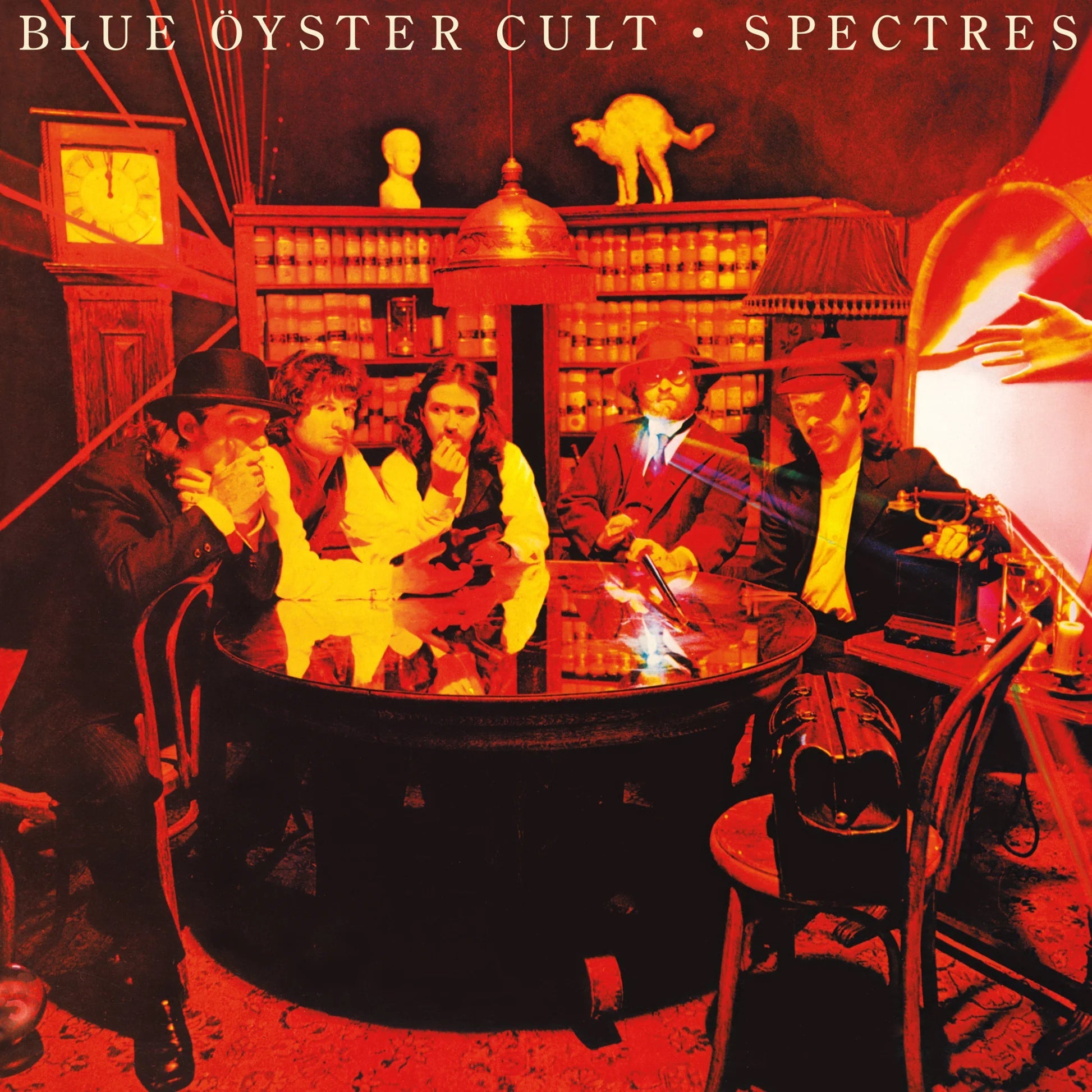 Blue Oyster Cult "Spectres" vinyl album cover with band portrait and antique setting.