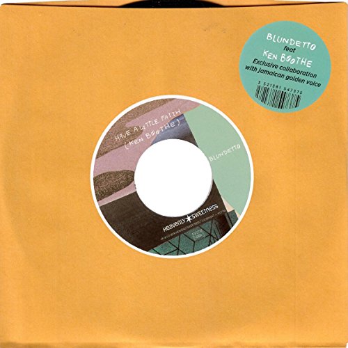 Orange vinyl record sleeve with a visible vinyl record and barcode sticker.
