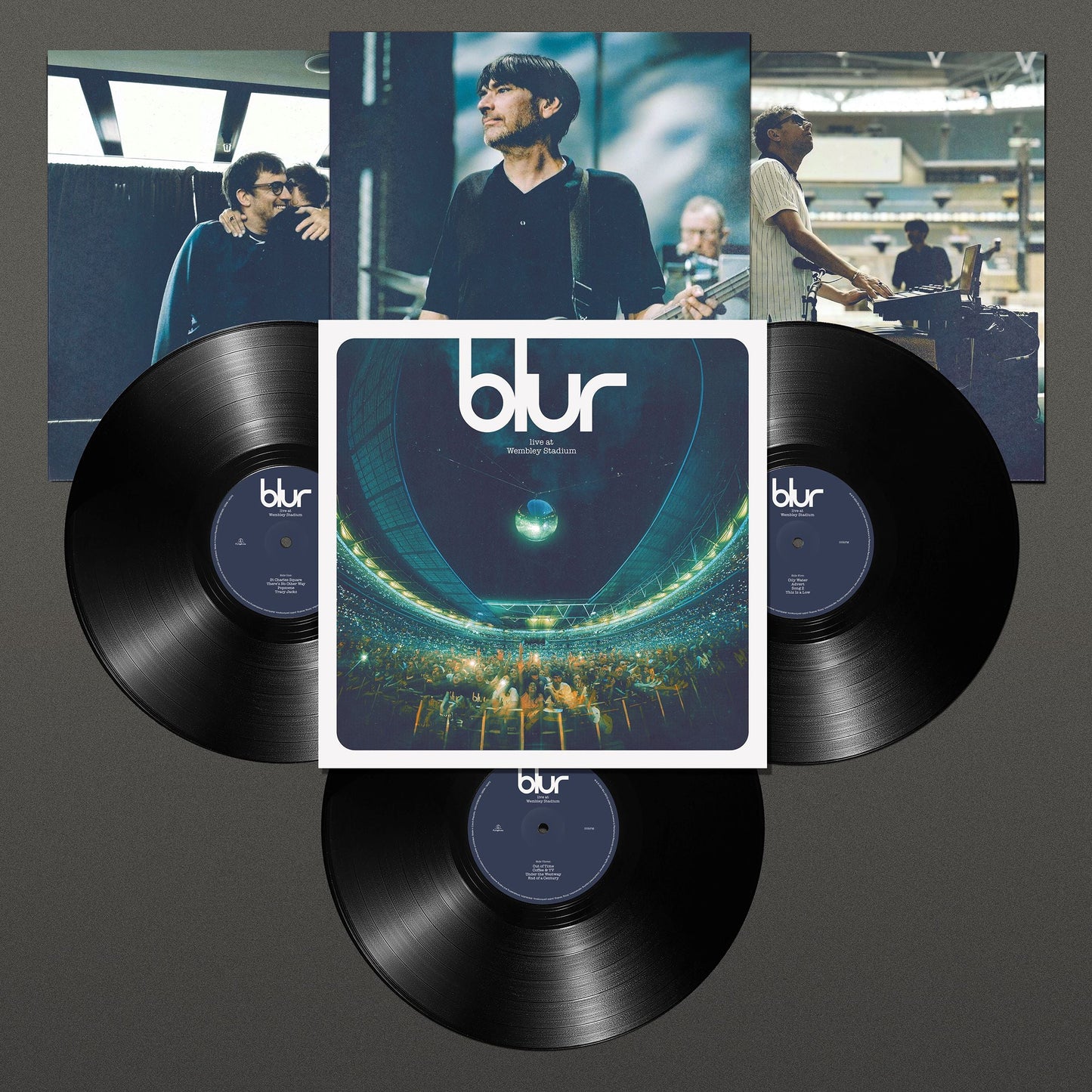 Three black vinyl records and album artwork for Blur Live at Wembley Stadium.