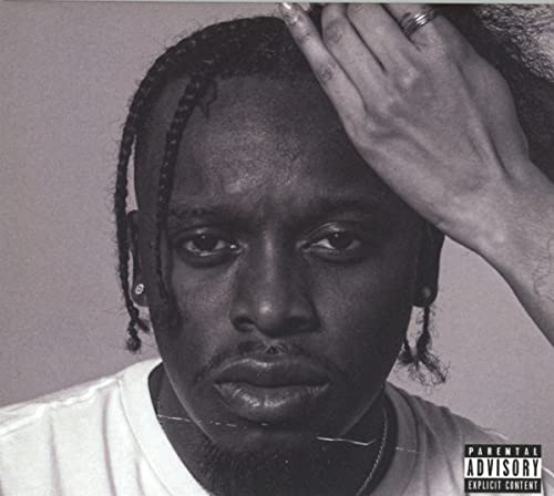 Black and white portrait of Blxst with hand over face, CD packaging.
