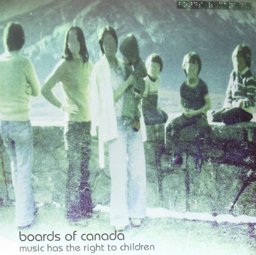 Faded vintage photo of six people standing outdoors with the album title text below.