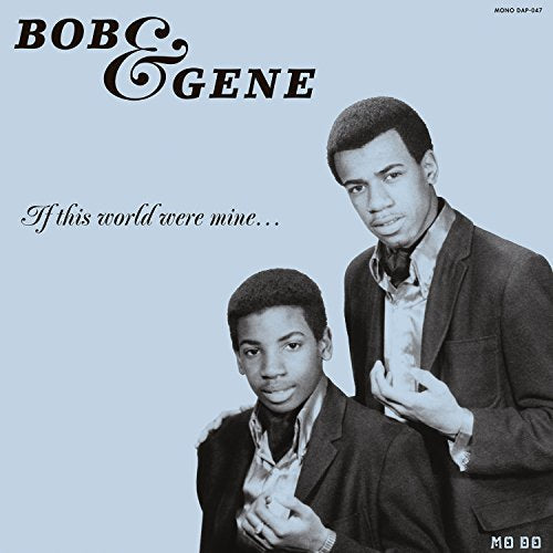 "Black and white vinyl album cover featuring two men in suits against a light background."