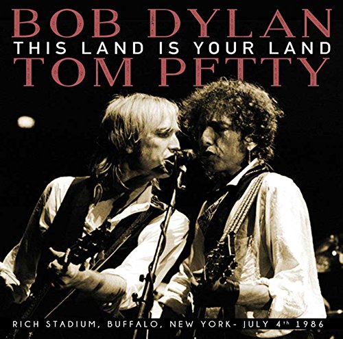 AlbumSépia photo of Bob Dylan and Tom Petty performing together on stage.
