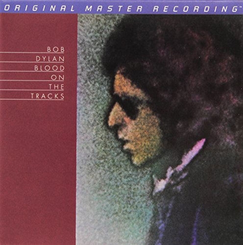 Bob Dylan’s “Blood On The Tracks” CD cover with a portrait of Dylan.
