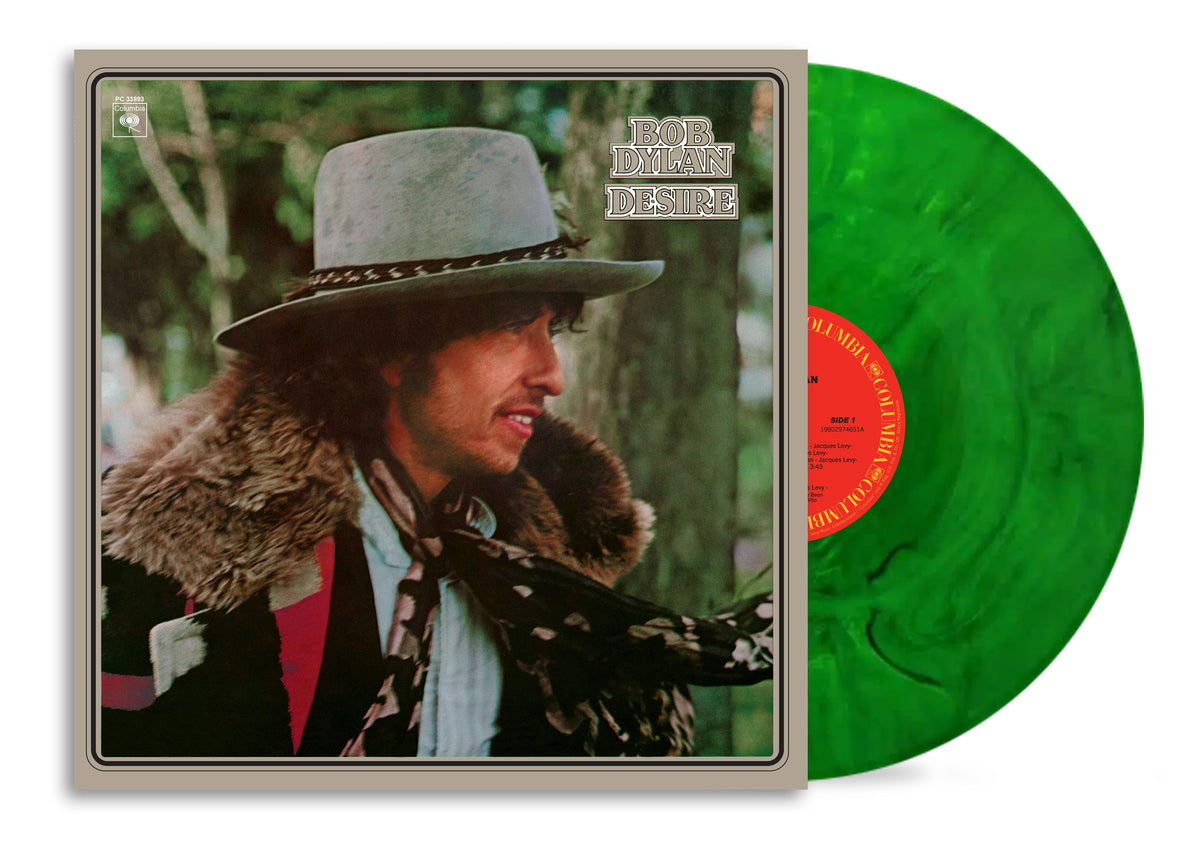 Bob Dylan’s “Desire” vinyl record with a green disc and cover art.