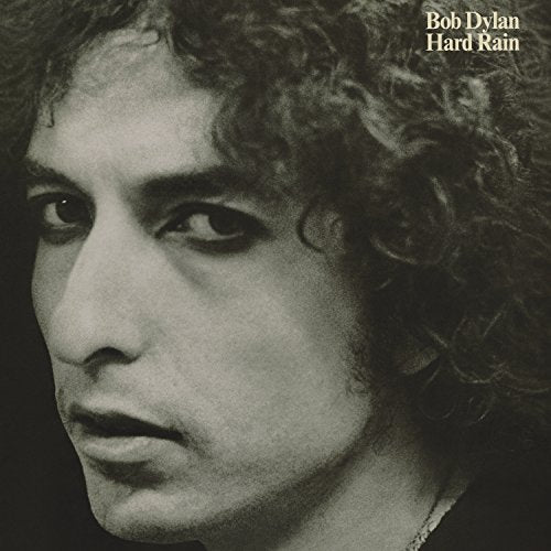 Black and white vinyl record album cover featuring a close-up of Bob Dylan's face.