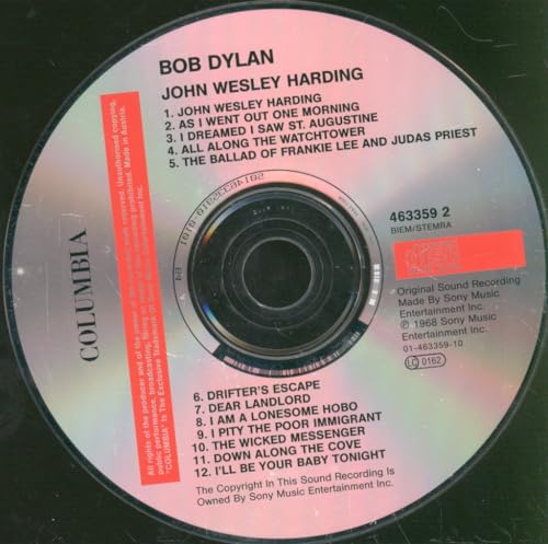 A silver Bob Dylan John Wesley Harding CD with tracklist printed on the surface.