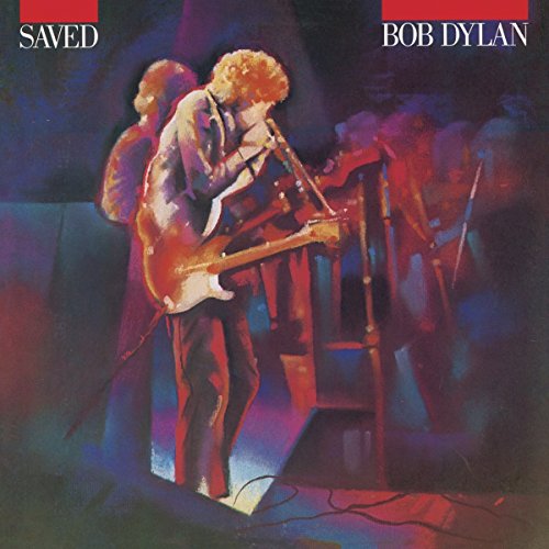 Bob Dylan’s “Saved” vinyl album cover featuring a painted image of him playing guitar.