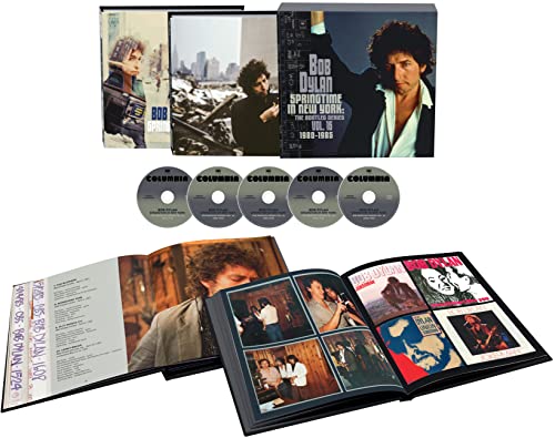 Bob Dylan box set including CDs, a photo book, and promotional materials.