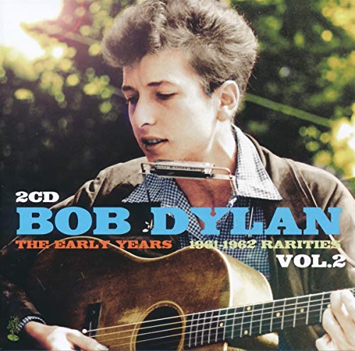 Bob Dylan playing guitar with harmonica, album cover for "The Early Years Rarities.
