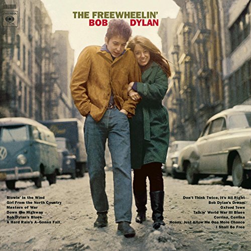 Bob Dylan album cover: Dylan and a woman walking on a city street.