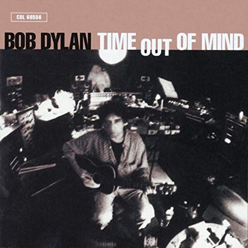 Bob Dylan album cover, “Time Out of Mind,” with a shadowy portrait.