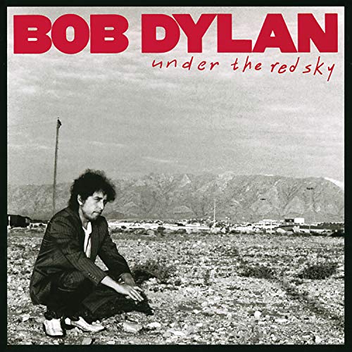 Bob Dylan album cover: a crouching Dylan before a landscape.
