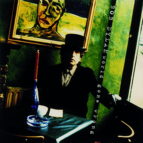 Bob Dylan album cover, "World Gone Wrong," featuring a portrait and man in a hat.