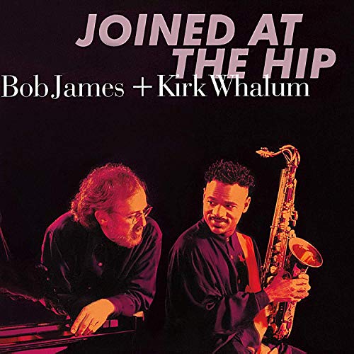 Album cover with two men, one playing piano, the other holding a saxophone.