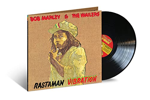 Bob Marley and the Wailers Rastaman Vibration vinyl record and cover on white background.