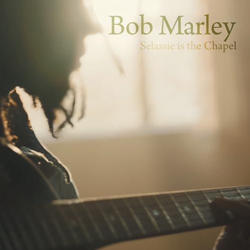 Silhouette of Bob Marley playing guitar with text overlay reading Bob Marley Selassie is the Chapel.