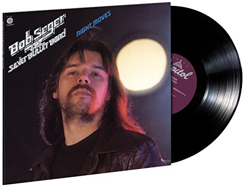 Bob Seger’s “Night Moves” vinyl record and album cover with portrait.