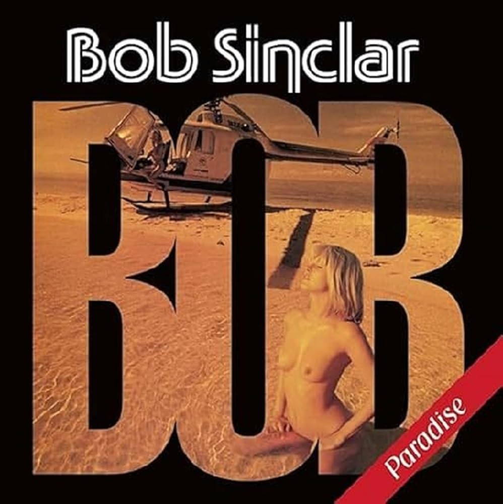Bob Sinclair album cover with helicopter, sand, and a nude figure.