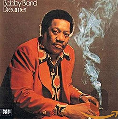 Bobby Bland portrait on album cover, with smoke and orange jacket.