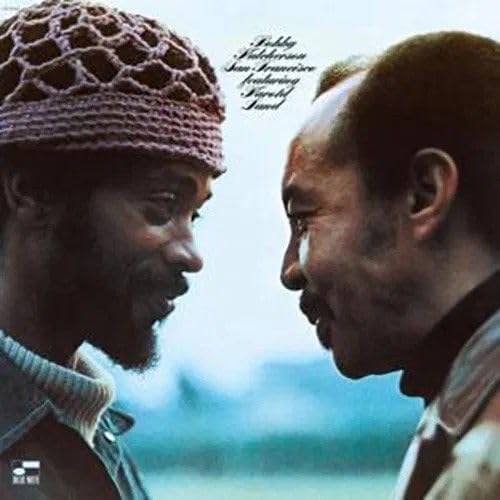 Album cover featuring portraits of two Black jazz musicians facing each other.