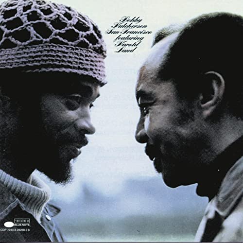 Album cover featuring close-up portraits of two Black jazz musicians.