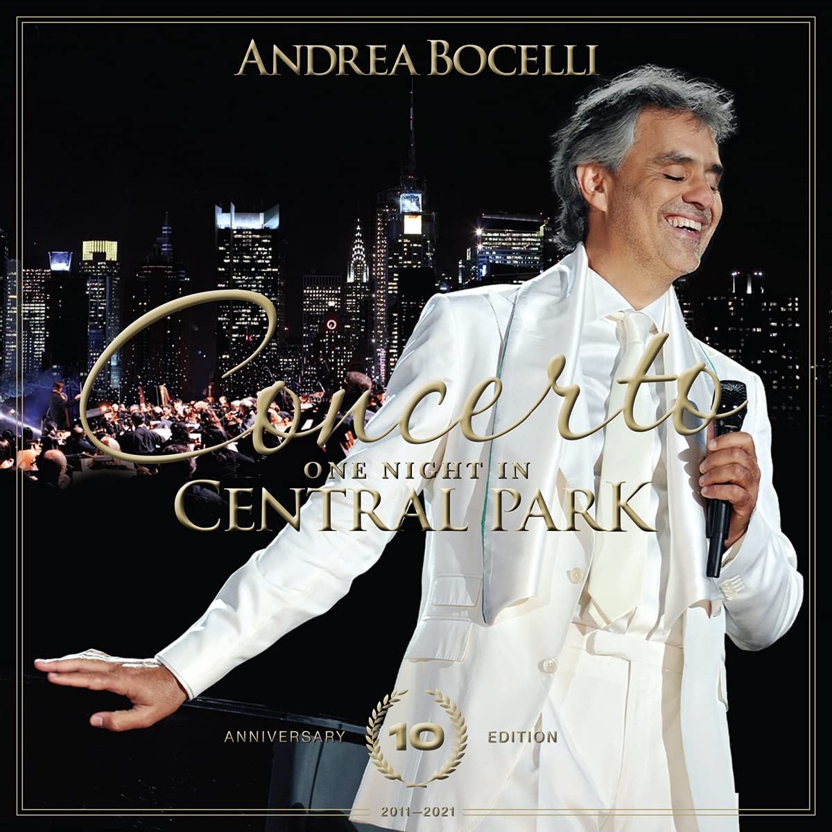 Andrea Bocelli CD cover with a cityscape and orchestra backdrop.