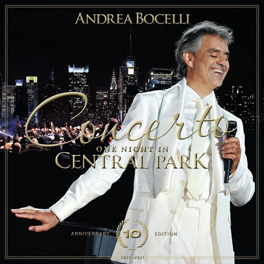 Andrea Bocelli CD cover with a cityscape and orchestra backdrop.