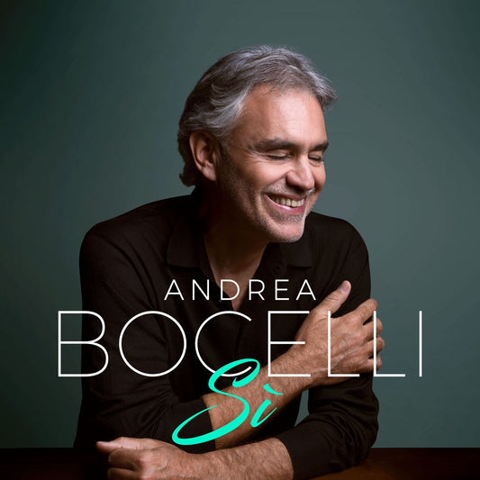 Andrea Bocelli album cover featuring a smiling man with gray hair against a dark background.