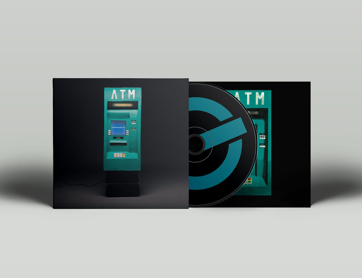 CD cover and disc featuring a teal ATM on a black background.