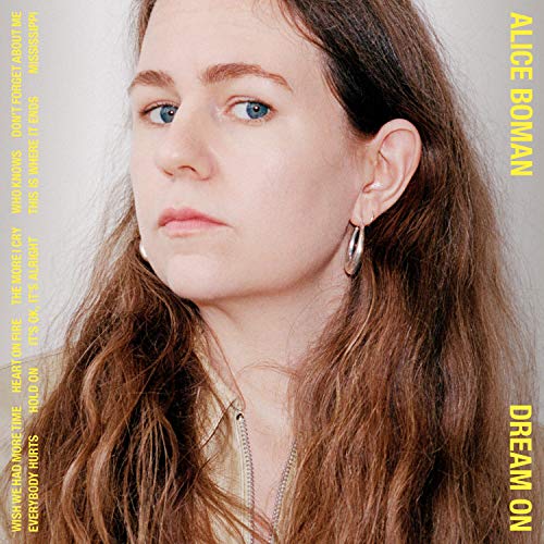 Vinyl record cover featuring a close-up portrait of a woman with long brown hair.