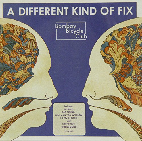 "Album cover with two illustrated heads facing each other, blue background, and tracklist."