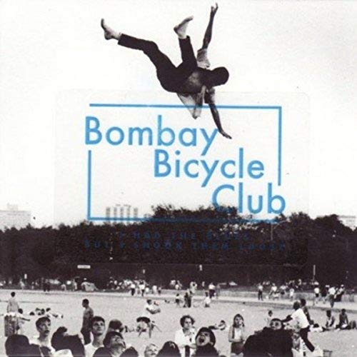 Vinyl cover showing a person jumping above a beach scene with blue text overlay.