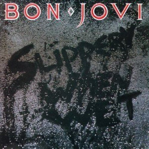 Bon Jovi’s “Slippery When Wet” CD cover with dark, textured imagery.