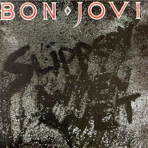 Album cover for Bon Jovi's Slippery When Wet with textBCSlippery When Wet written in graffiti.