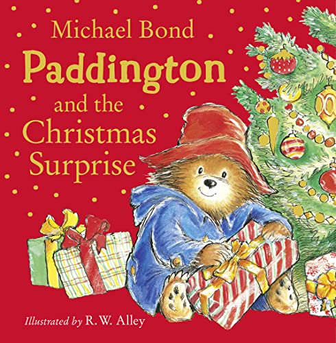 Paddington Bear with Christmas gifts and a decorated tree.
