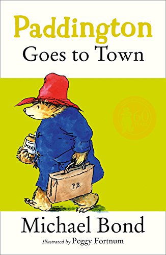 Paddington Bear with suitcase on a bright green book cover.
