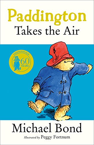 Paddington Bear in a blue coat and red hat, book cover.