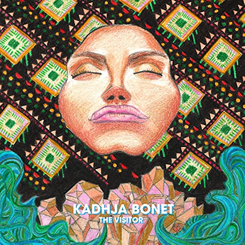 CD cover art: close-up of a woman’s face with colorful, patterned background.