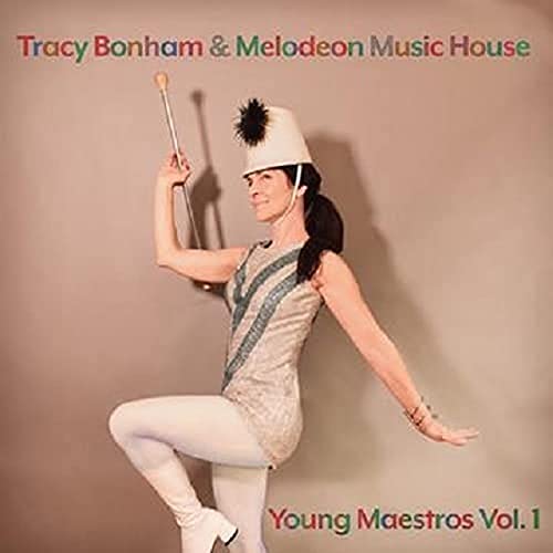 CD cover featuring a woman in a drum major uniform and hat.