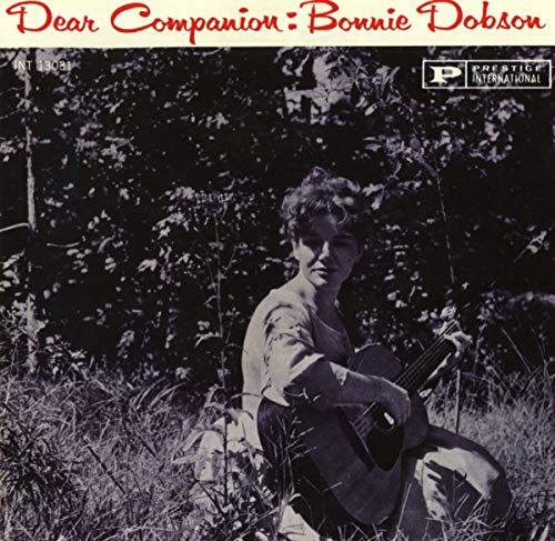 Bonnie Dobson album cover: woman with guitar in a field.