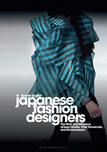 Book cover featuring a model in layered blue striped fabric, title: Japanese Fashion Designers.